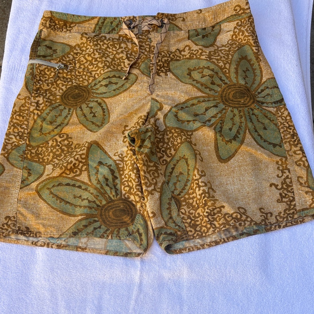 Patagonia Brown and Teal Floral Drawstring Man shorts.